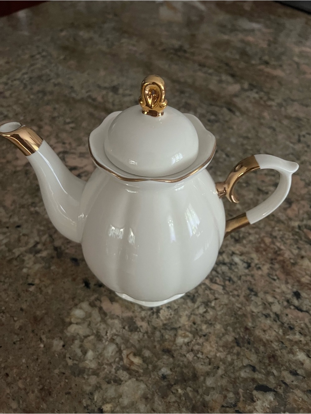 White Porcelain Teapot with Gold Accents